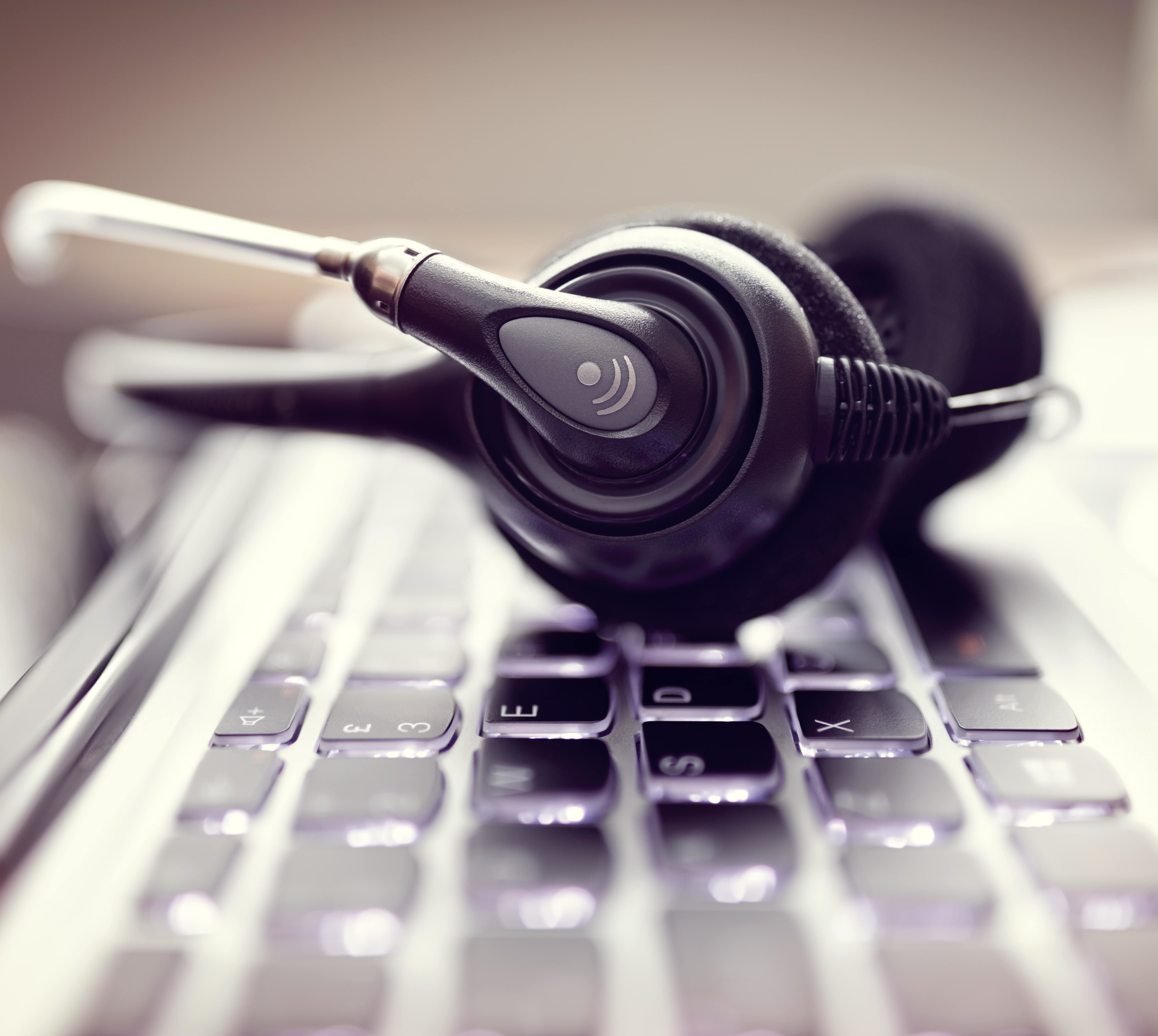 Helpdesk headset on keyboard